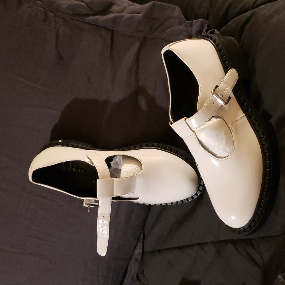 Mary Janes white with black sole